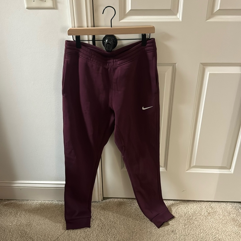 Burgundy Nike sweatpants